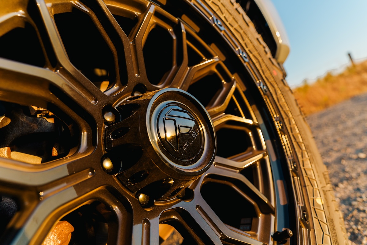 Close-up of a bronze Fuel Off-Road wheel with VNOX hardware