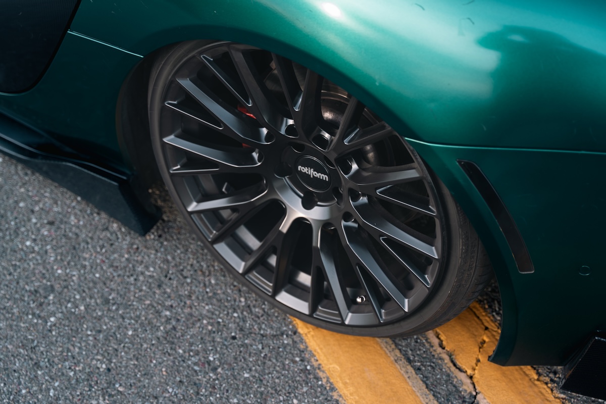 Green sports car on Rotiform wheels with VNOX hardware
